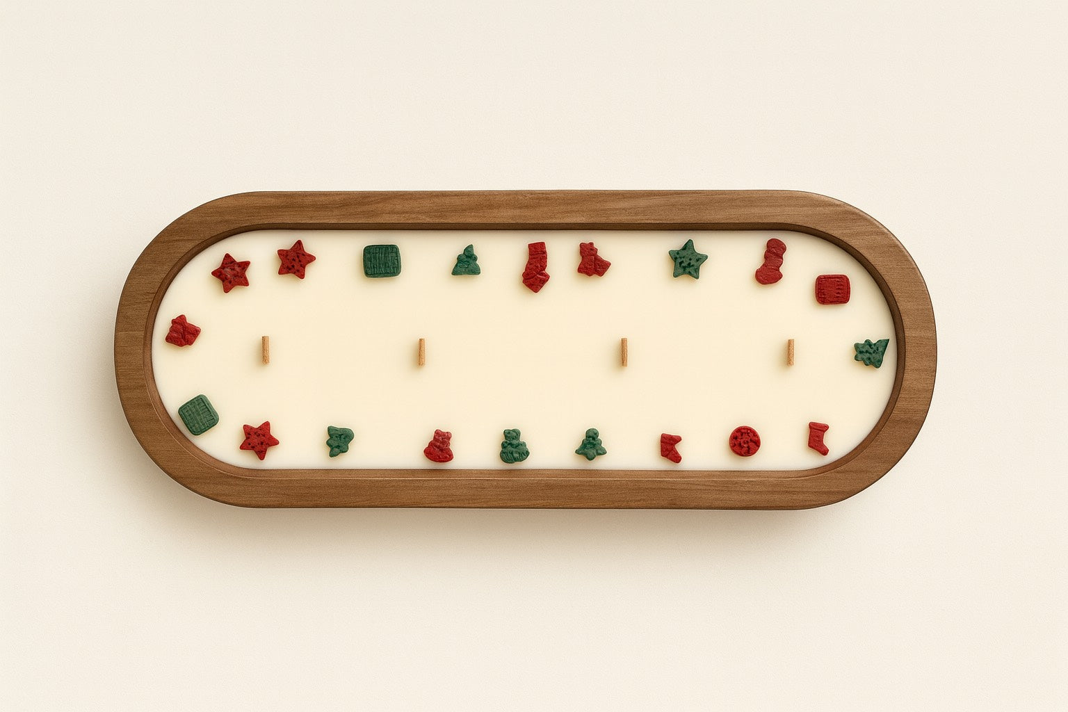 Large soy wax holiday tray candle centerpiece in a wooden bowl with festive Christmas shapes