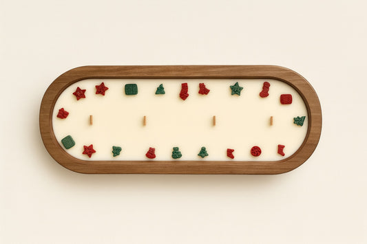 Large soy wax holiday tray candle centerpiece in a wooden bowl with festive Christmas shapes